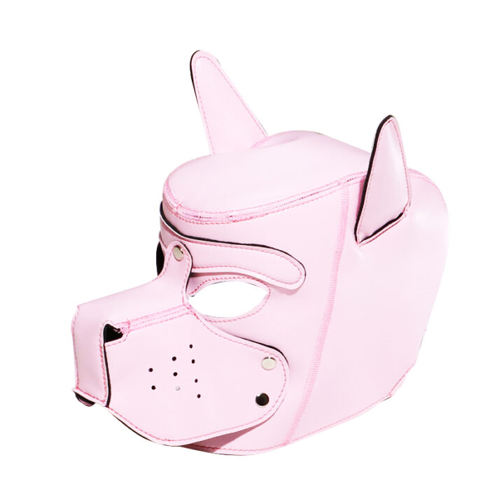 a pink leather pup play hood, designed for BDSM role-playing. The hood has an animalistic, specifically canine, design with features such as ears and a snout. It covers the entire head, leaving openings for the eyes and mouth. The snout area appears to be detachable or adjustable, allowing for different play scenarios. This type of hood is typically used in fetish and BDSM contexts to enhance the experience of role-playing and submission. The color and design elements suggest it is crafted to be both functional and visually appealing.