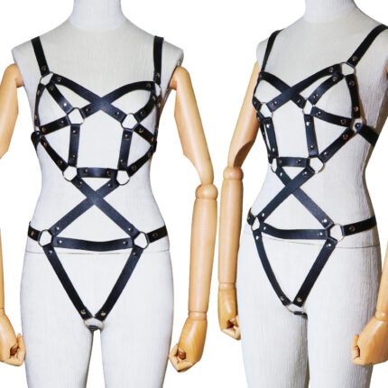 a black leather body harness with multiple straps and metal rings. The harness features a complex, crisscross design across the chest and torso, with adjustable buckles for a secure and comfortable fit. The straps wrap around the shoulders, waist, and hips, creating a bold and stylish look. This type of harness is typically used in fashion or for BDSM activities, adding an element of aesthetic appeal and functionality.