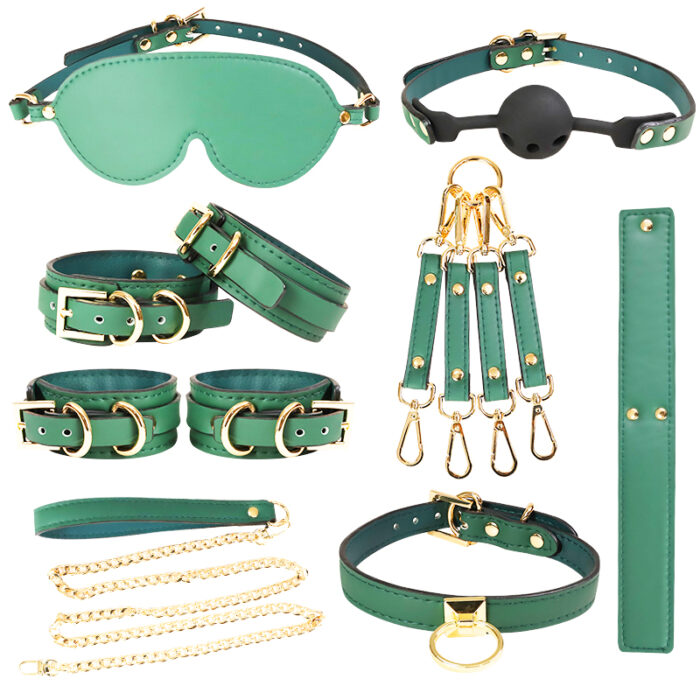 a set of green bondage accessories, including an eye mask, a ball gag, wrist and ankle cuffs, a collar with a leash, connecting straps, and a paddle. Each item is designed with green leather and gold hardware, adding a luxurious touch to the set. These accessories are intended for sensory play and BDSM activities, offering a stylish and intimate experience.