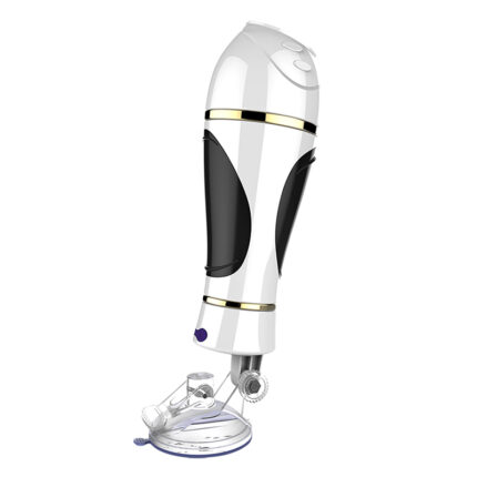 A sleek white and black handheld device with gold trim and a transparent collection chamber at the bottom, designed as an adult sex toy. The equipment is upright, displaying its curved form and several buttons on the top. It sits on a clear base for stability.