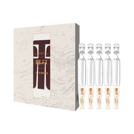 The image shows a product packaged in a beige box with abstract design elements. The box has a window through which five clear glass vials are visible. Each vial has a white cap and contains a clear liquid.