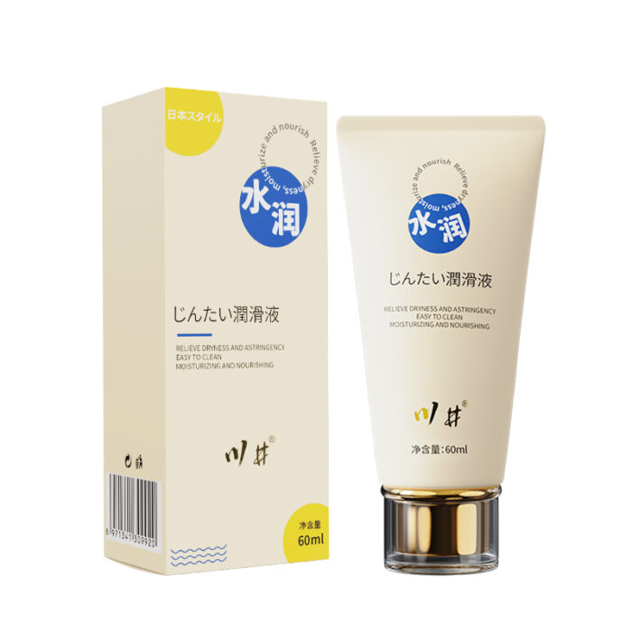 The image features a tube of body lotion with a sleek, modern design. The packaging is primarily beige with blue accents and gold detailing on the cap. The text on the tube and box is in Japanese, indicating the product is a body lotion with moisturizing properties. The overall design is elegant and professional.