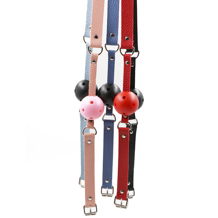 a collection of ball gags, which are bondage accessories typically used in BDSM practices. The ball gags feature different colored straps, including blue, pink, red, and black. Each strap is equipped with a round ball that fits into the mouth and is secured with adjustable buckles, allowing for a snug and comfortable fit. The balls also vary in color, with options such as black, red, and pink. The design suggests durability and comfort, aiming to provide a secure and enjoyable experience for users interested in restraint play.