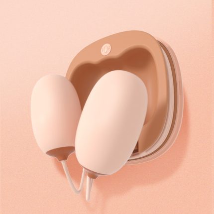 A pink and white dual-head massager with a charging base. Modern design, suitable for enhancing pleasure experience and personal relaxation, easy to operate, soft material.