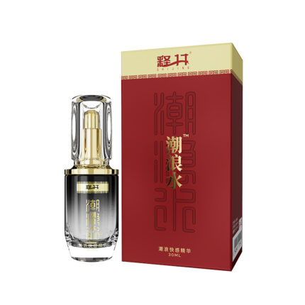 a product consisting of a transparent bottle with gold detailing and a red box. The box features Chinese text and branding elements in gold and white.