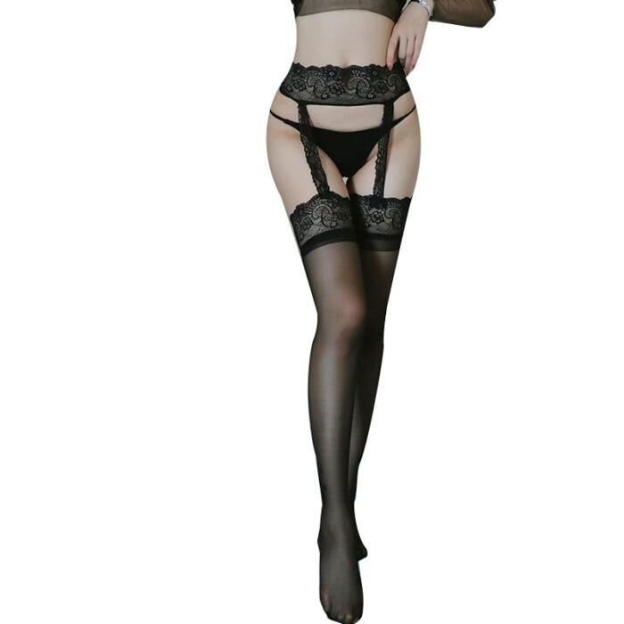 The model is wearing a seductive black lace garter belt with matching black thigh-high stockings and a coordinating black thong, exuding elegance and allure.