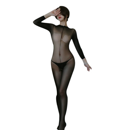 A model is seen wearing a sheer, black, full-body bodysuit with long sleeves and a high neckline, creating a sleek and alluring look.