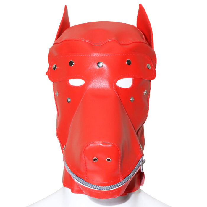 a red BDSM dog mask designed for role-playing and fetish activities. The mask covers the entire head, featuring eye holes for vision and a zipper over the mouth area for adjustable mouth access. The mask is made from a material that appears to be leather or faux leather, with metallic studs for added decoration and structure. It has pointed ears at the top, mimicking a dog's appearance.