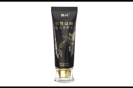 The image shows a black tube with gold and white lettering. The product is elegantly designed with gold leaves and text, featuring a transparent base and gold cap. The text appears to be in Japanese and indicates that the product is a gel, likely intended for men.