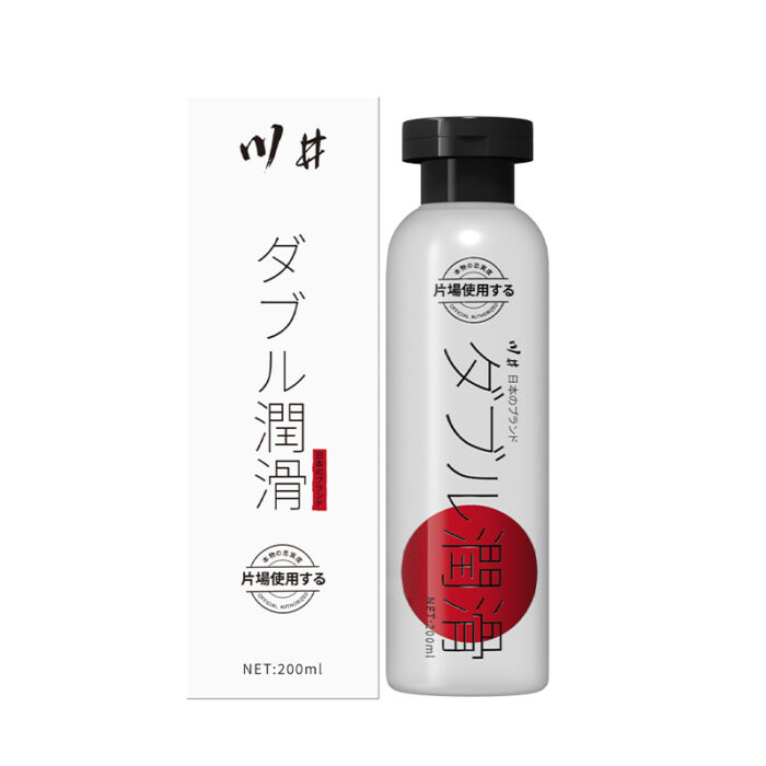 The image features a bottle of lubricant with a sleek, modern design. The bottle is white with black and red accents, including a black cap. The label displays Japanese characters and the product name, indicating it has double lubrication. The packaging exudes a high-end and professional appearance.