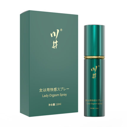 a female orgasm spray product with a simple and elegant design. The spray bottle is green, with the brand name and product information printed on it, giving it a high-end and stylish appearance. The packaging box is also primarily green, with gold text, displaying the phrase “Lady Orgasm Spray” on the front, indicating the product's function. The overall design looks professional and high-quality, suitable for female users who value effectiveness and attractive packaging.